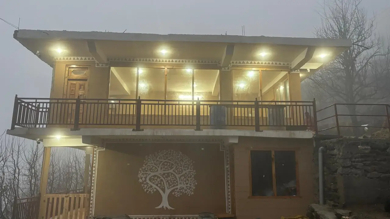 Mizuki Retreat glowing at dusk in the mist